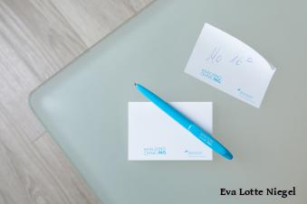 KDOI - Haftnotiz mit Notiz und Kulli